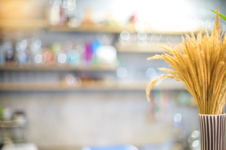 blur  wood  cupboard in restaurant with rice flower background bokeh