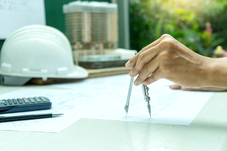 architect or engineer working on table show work man and woman for business project