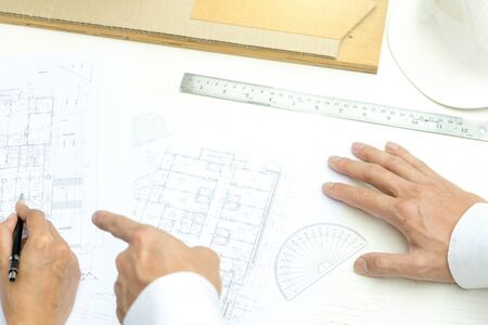 architect or engineer working on table show work man and woman for business project