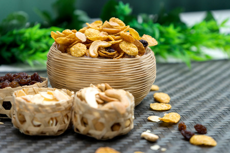 cornflake caramel snack food healthy nutrition meal with texture of brown material Bamboo weaveの写真素材