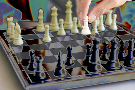 Businessman thinking how to play chess concept business strategy for win