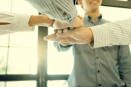 Businessman hand together Handshake for business project teamwork , business people deal success