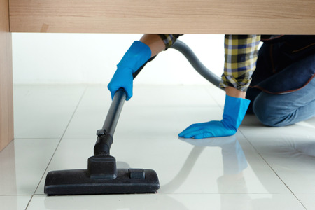 man work for clean house window sofa table in the house houseworkの写真素材