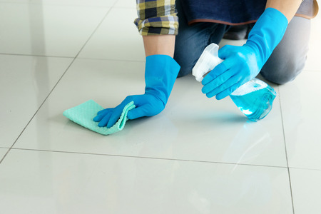 man work for clean house window sofa table in the house houseworkの写真素材