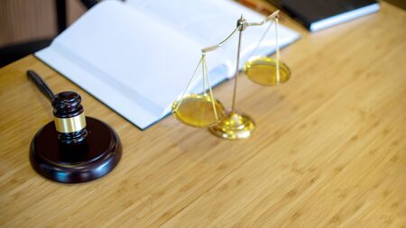 Lawyer firm office, gavel and balance on the table with book background concept law firm crop 16:9の写真素材