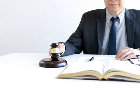 In the office of Judge or lawyer, there are balance and gavel on the table. Law firm Concept.の写真素材