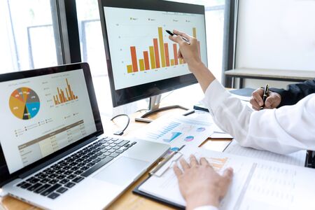 Businessman coaching office staff for business marketing planの写真素材