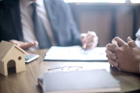 Office meeting , Loan business finace read report from data analysis or bank marketing for houseの写真素材