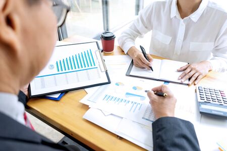 Businessman coaching office staff for business marketing planの写真素材