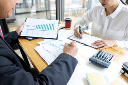 Businessman coaching office staff for business marketing planの写真素材