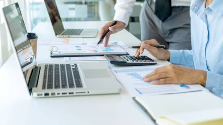 businessman in meeting analysis chart graphy marketing plan in business financial  audit project. Or Business adviser analyzing Budget. crop 16:9の写真素材