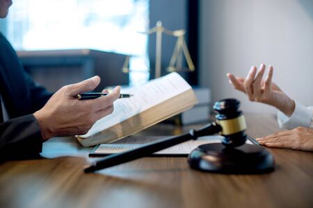 in the law office Judge gavel with Justice lawyers, Businessman in suit or lawyer working with legal...