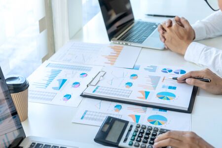 businessman in meeting analysis chart graphy marketing plan in business financial  audit project. Or Business adviser analyzing Budget.の写真素材