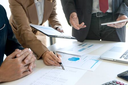 small business Meeting group in conference room, Business person discussing work sitting at table in office.の写真素材