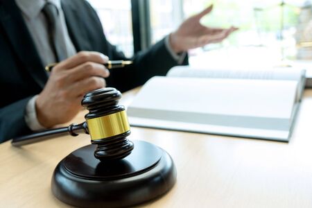 Judge or lawyer talking  with team or client about consult law detail, law firm concept.の写真素材