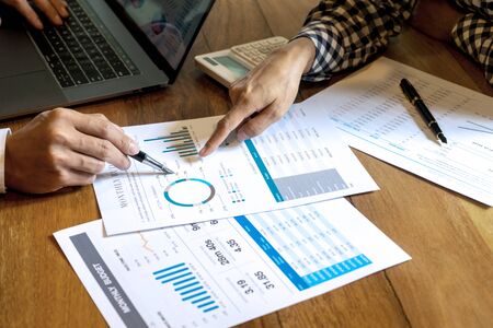 young business team in casual style have small meeting in the office talk about  analyses chart...