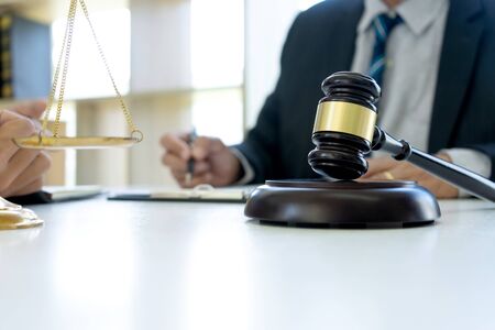 Judge or lawyer talking  with team or client about consult law detail, law firm concept.の写真素材