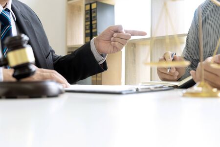 Judge or lawyer talking  with team or client about consult law detail, law firm concept.の写真素材