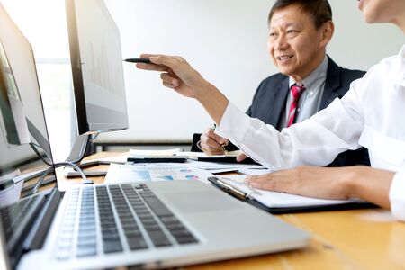 Businessman coaching office staff for business marketing planの写真素材