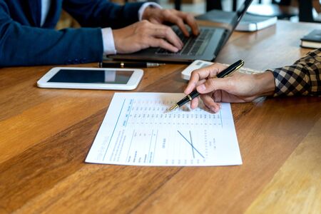 young business team in casual style have small meeting in the office talk about  analyses chart...