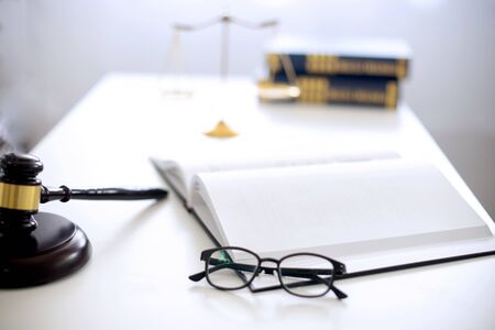 Judge lawyer gavel work in office with  balance  in law firm conceptの写真素材