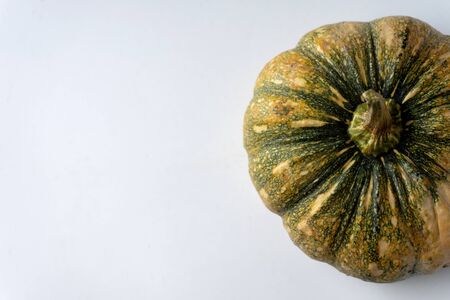 Pumpkin raw food ,fruit for eat and decoration in Halloween day on white background. Top view half frameの写真素材
