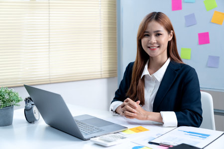 young businesswoman friendly smile at work and welcome to business dealingsの写真素材