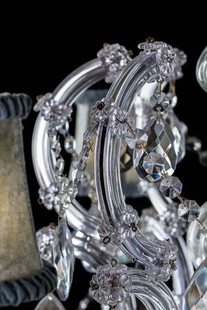 Chrystal chandelier close-up. On black background with copy spaceの写真素材
