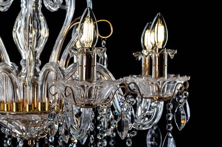 Chrystal chandelier close-up. On black background with copy spaceの写真素材