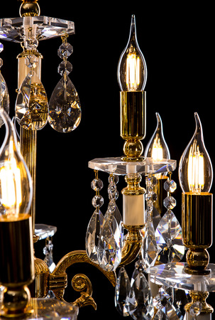 Close-up floor lamp on black background. luxury torchere gold.の写真素材