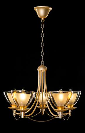 Chandelier light in interior on black backgroundの写真素材