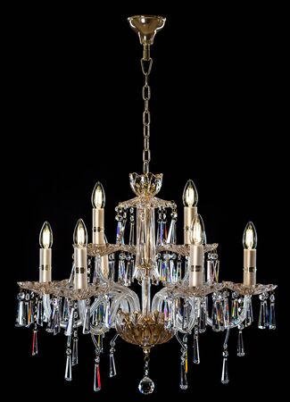 Contemporary glass chandelier isolated on black background.の写真素材