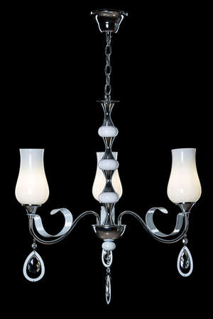 Silver metallic candelabra with candles.の写真素材