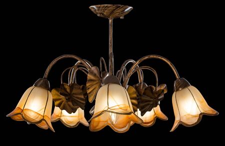 Chandelier light in interior on black backgroundの写真素材