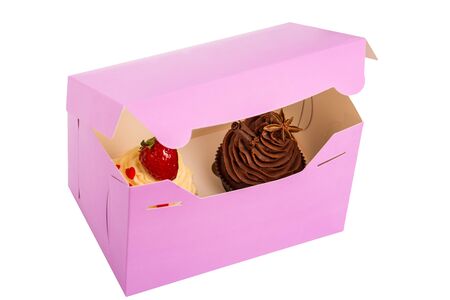 Two Cupcakes are in the Delivery Box over white backgroundの写真素材