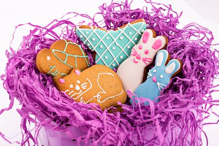 Closeup of tasty Gingerbread colorful figure cookies isolated on whiteの写真素材