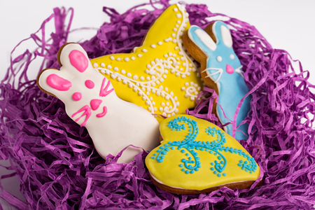 Closeup of tasty Gingerbread colorful figure cookies isolated on whiteの写真素材