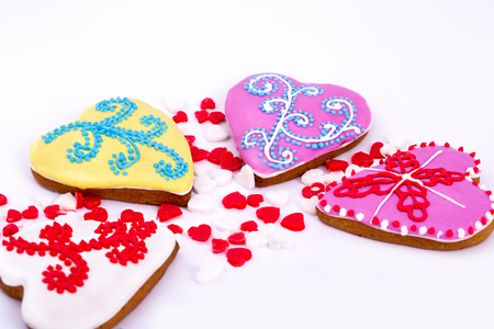 Easter cokkie. Gingerbread easter cookies in shape of heart. White background.の写真素材