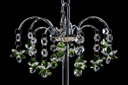 Contemporary silver chandelier isolated on black background. Crystal chandelier close-upの写真素材