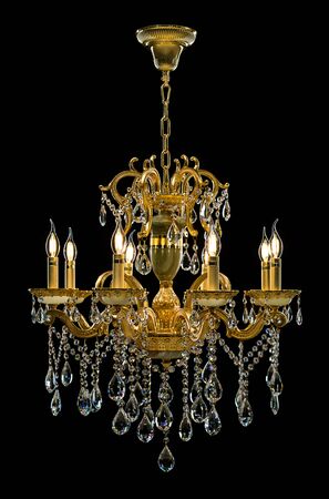 Contemporary gold chandelier isolated on black background. Crystal chandelierの写真素材
