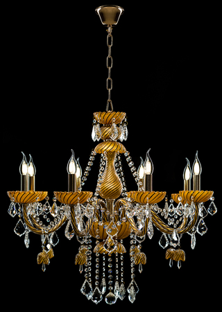 Contemporary gold chandelier isolated on black background. Crystal chandelierの写真素材