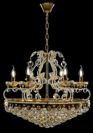 Contemporary gold chandelier isolated on black background. Crystal chandelierの写真素材