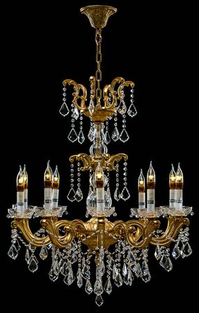 Contemporary gold chandelier isolated on black background. Crystal chandelierの写真素材