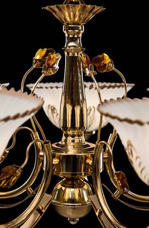 Chandelier classic isolated on black background. Chandelier closeup , luxury retro style on dark background.の写真素材