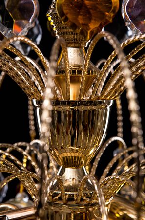 Chandelier for interior of the living room. chandelier details isolated on black background.の写真素材