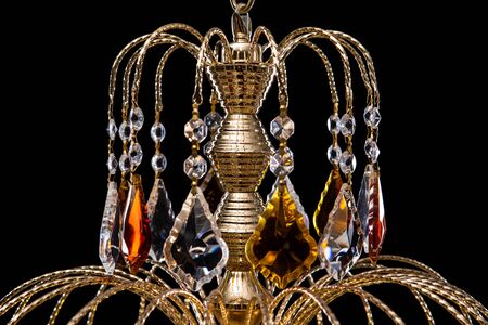 Chandelier for interior of the living room. chandelier details isolated on black background.の写真素材