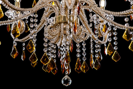 Chandelier for interior of the living room. chandelier details isolated on black background.の写真素材