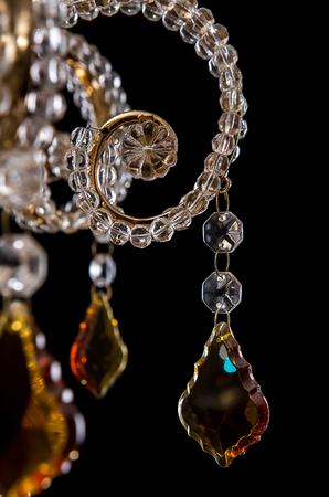 Chandelier for interior of the living room. chandelier details isolated on black background.の写真素材