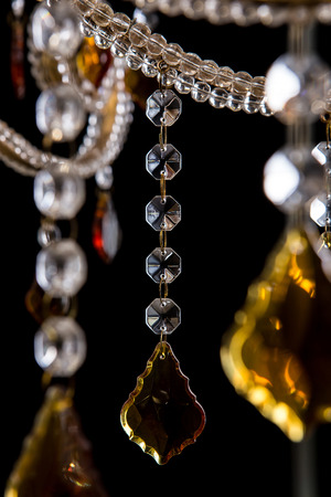 Chandelier for interior of the living room. chandelier details isolated on black background.の写真素材