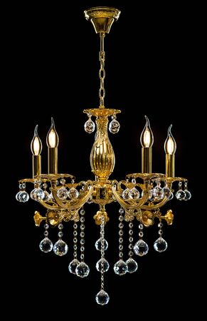 Chandelier for interior of the living room. chandelier decorated with crystals isolated on black background.の写真素材